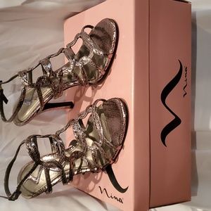 Strappy dress shoes. Made by Nina. Color is gunmetal.